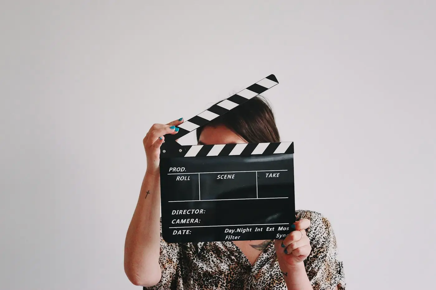 Actor holding a clapperboard at a casting