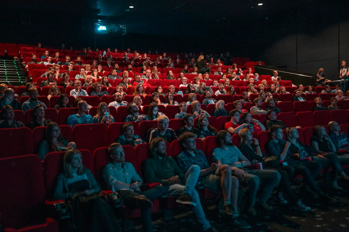Audience watching a film in a cinema
